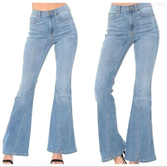 Mid Rise washed denim flared jeans. Size 27. Has some stretch.