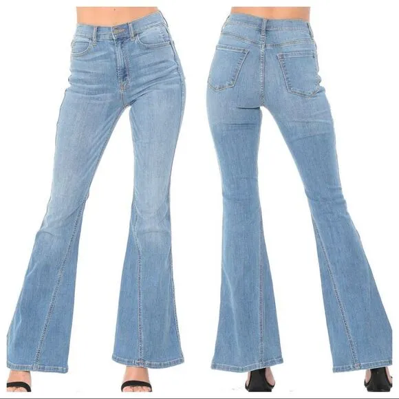 Mid Rise washed denim flared jeans. Size 27. Has some stretch.