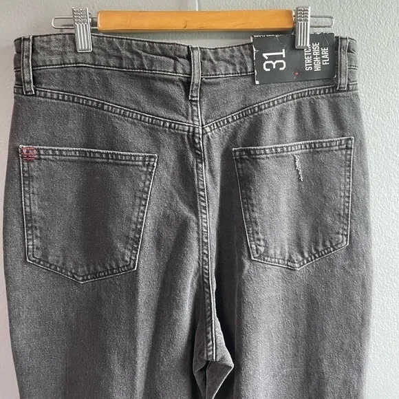 NWT Urban Outfitters BDG stretch hi rise flare faded distressed jeans. Size 31