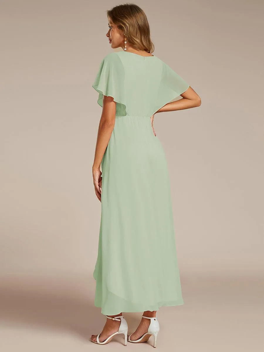 Robe Formelle élégante à Manches Courtes Et Taille Trapèze Avec Ourlet En Feuille De Lotus