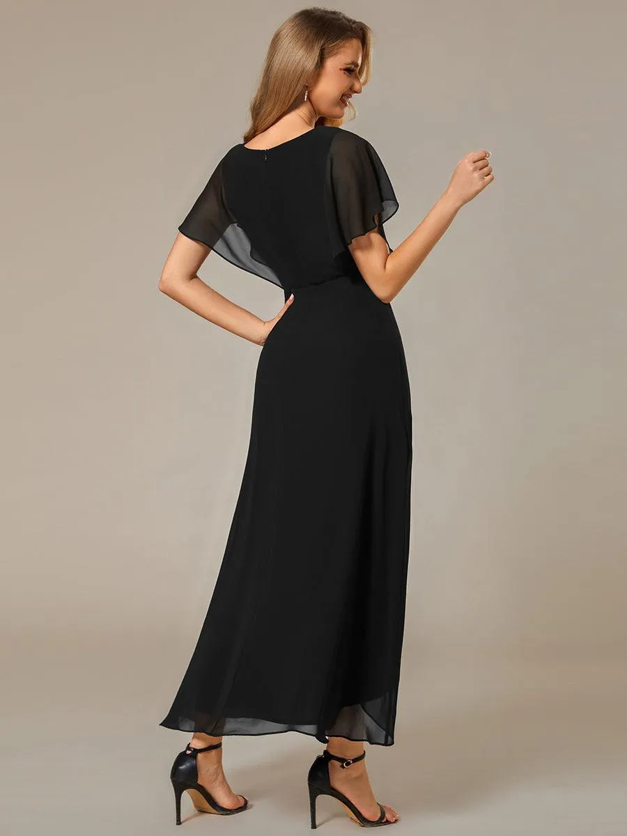 Robe Formelle élégante à Manches Courtes Et Taille Trapèze Avec Ourlet En Feuille De Lotus
