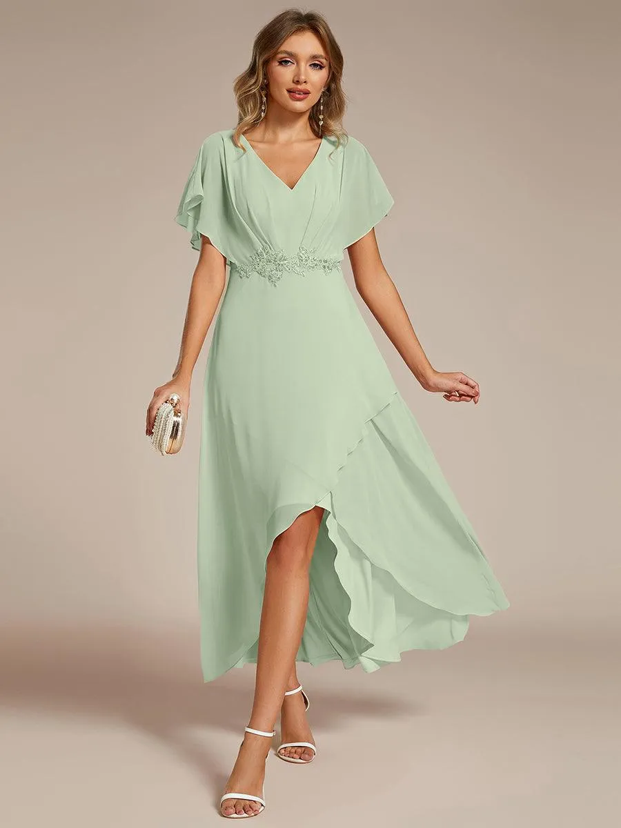 Robe Formelle élégante à Manches Courtes Et Taille Trapèze Avec Ourlet En Feuille De Lotus