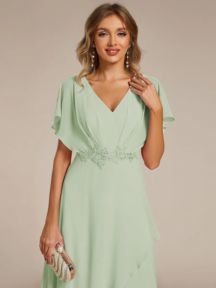 Robe Formelle élégante à Manches Courtes Et Taille Trapèze Avec Ourlet En Feuille De Lotus