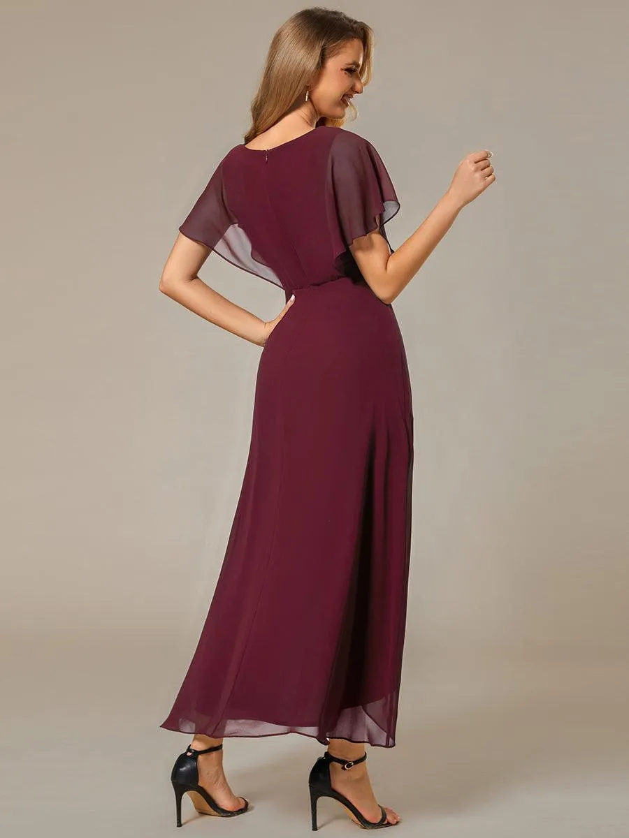 Robe Formelle élégante à Manches Courtes Et Taille Trapèze Avec Ourlet En Feuille De Lotus