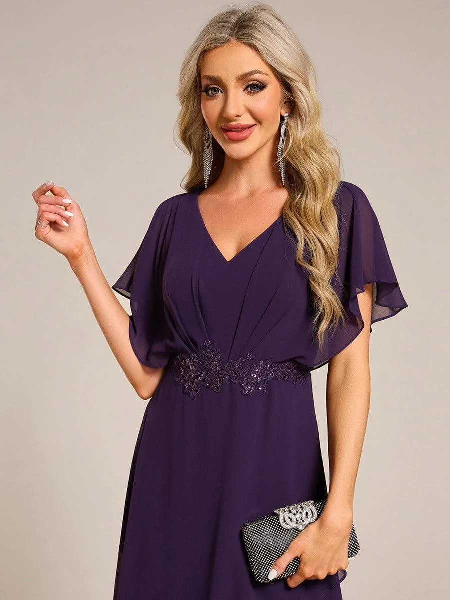 Robe Formelle élégante à Manches Courtes Et Taille Trapèze Avec Ourlet En Feuille De Lotus