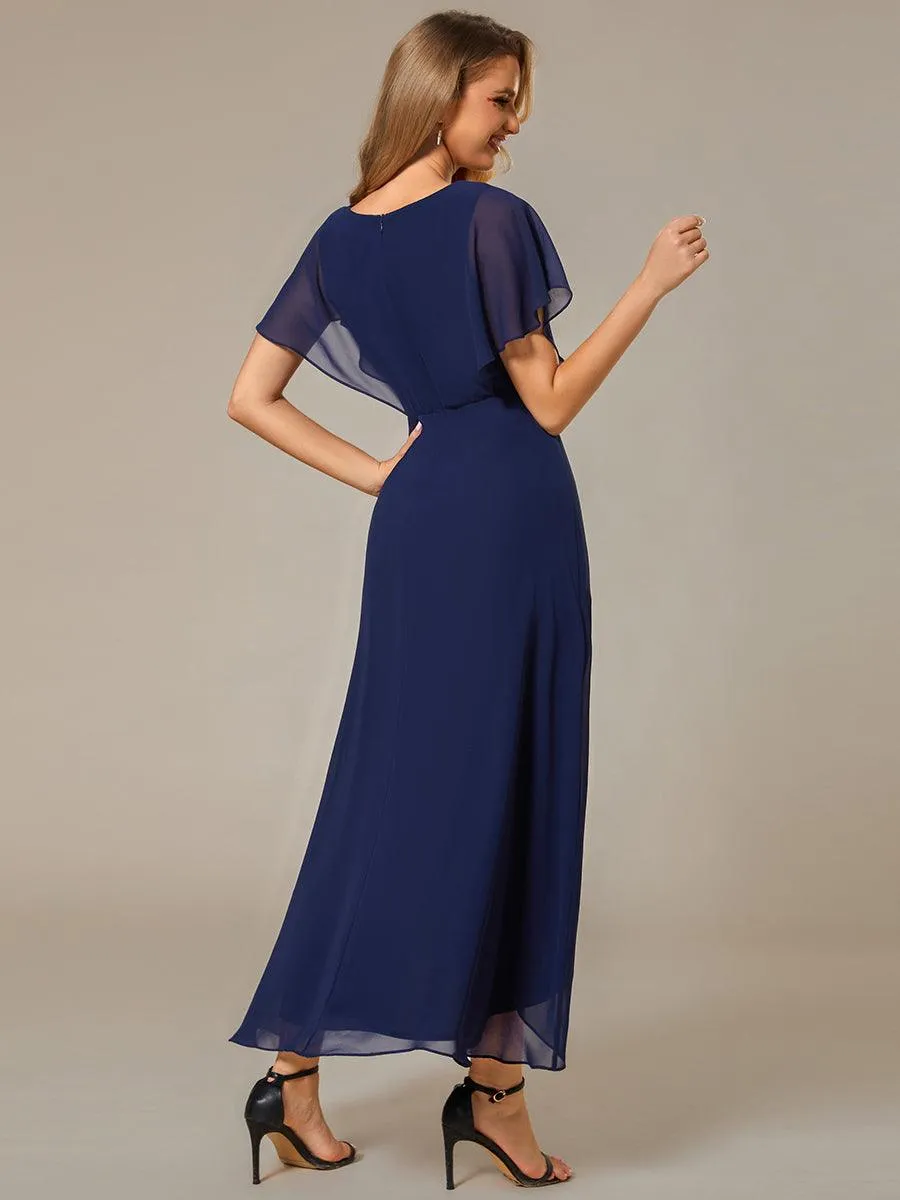 Robe Formelle élégante à Manches Courtes Et Taille Trapèze Avec Ourlet En Feuille De Lotus