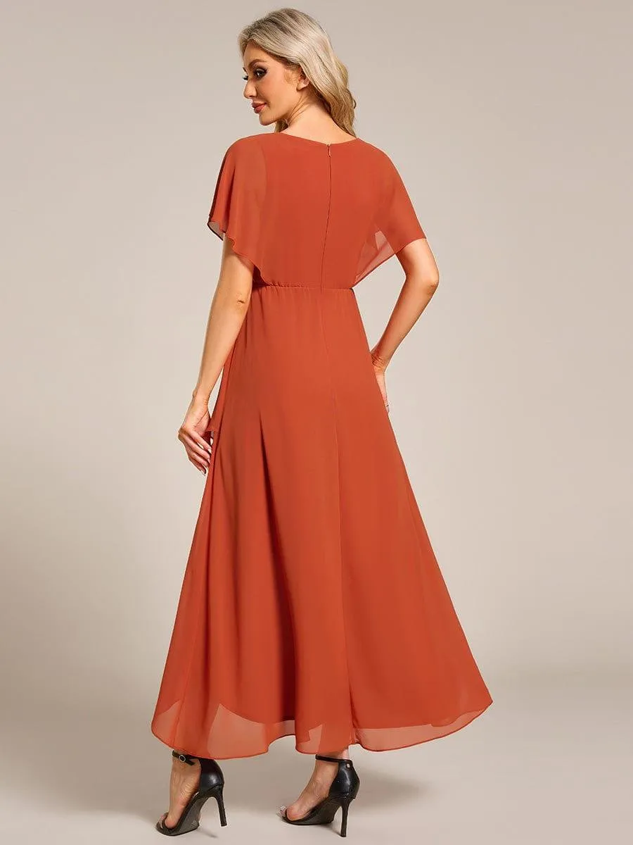 Robe Formelle élégante à Manches Courtes Et Taille Trapèze Avec Ourlet En Feuille De Lotus