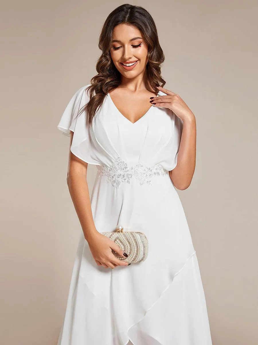 Robe Formelle élégante à Manches Courtes Et Taille Trapèze Avec Ourlet En Feuille De Lotus